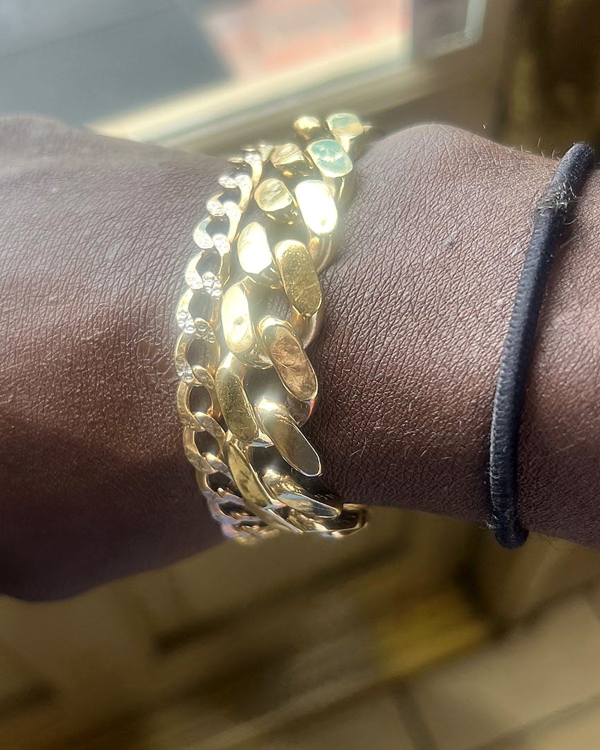 Gold curb-link bracelet